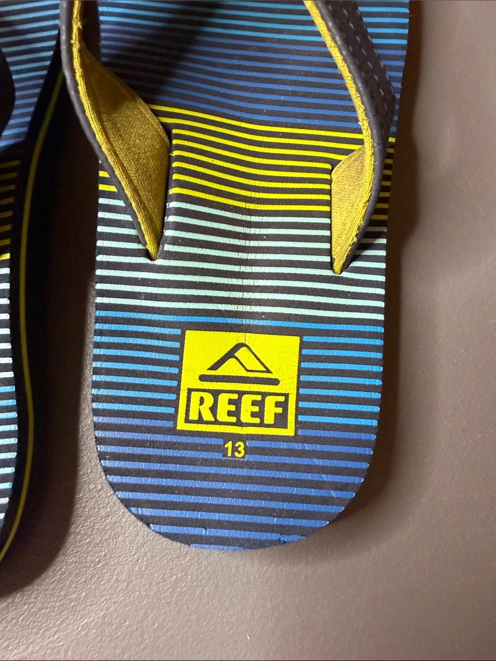 Kid’s Reef Blue & Yellow Striped Flip Flops. Size: 13